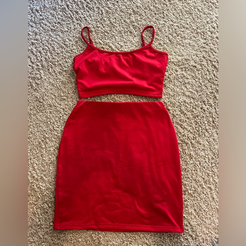 Red crop top with adjustable straps and matching high waisted skirt in Small